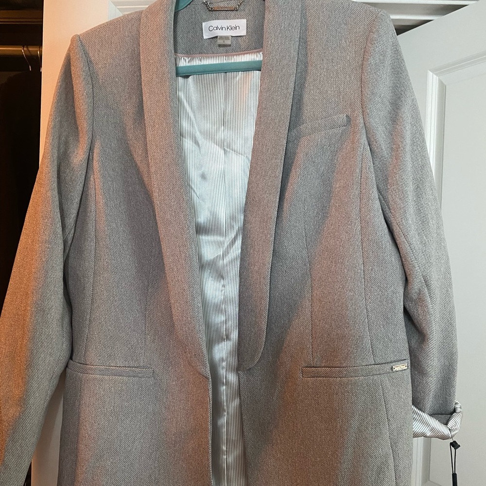 Modern Calvin Klein NWT size 12 lined blazer.